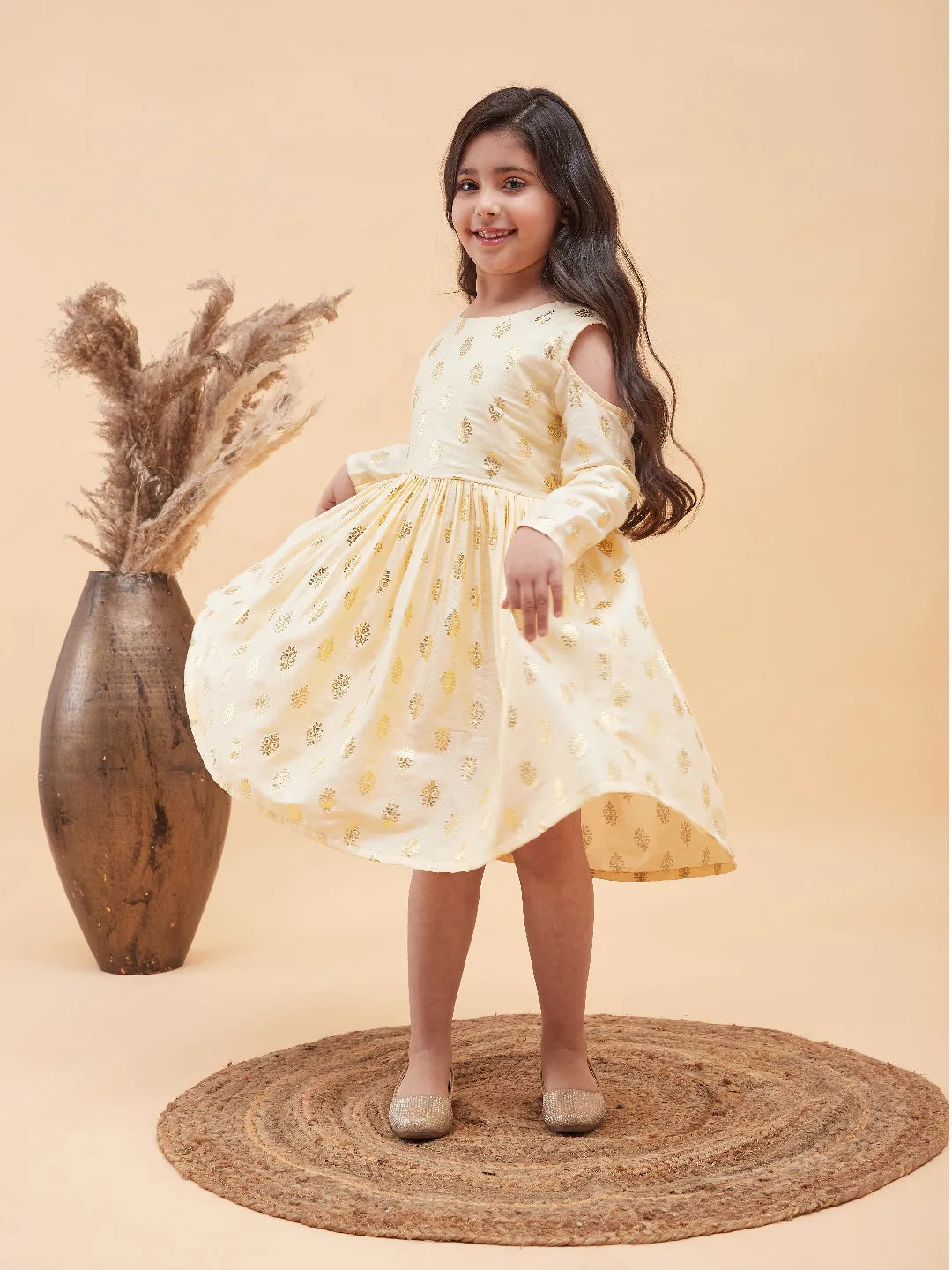 VASTRAMAY Girl's Cream Foil Printed Cold Shoulder Kurti